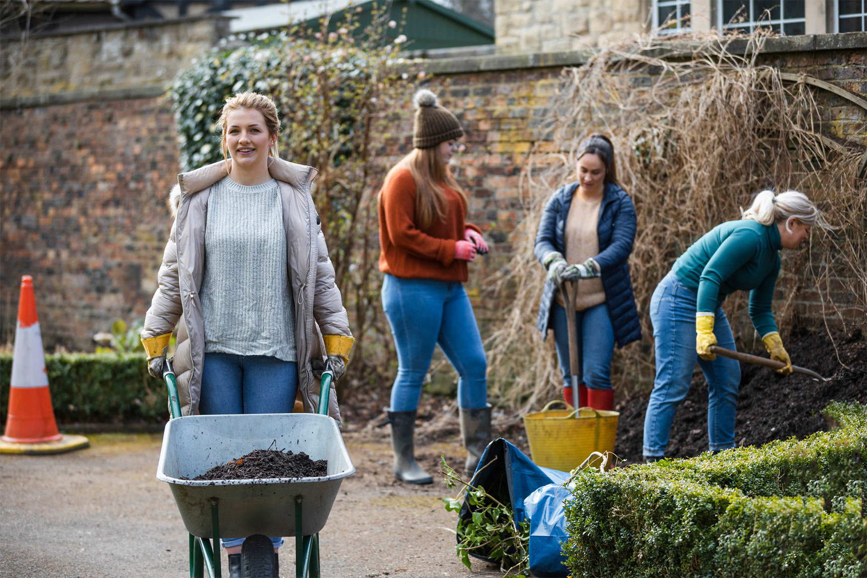 women gardening in the community